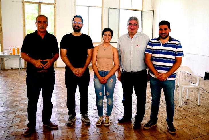 Funcionarios durante la conferencia en 25 de Mayo